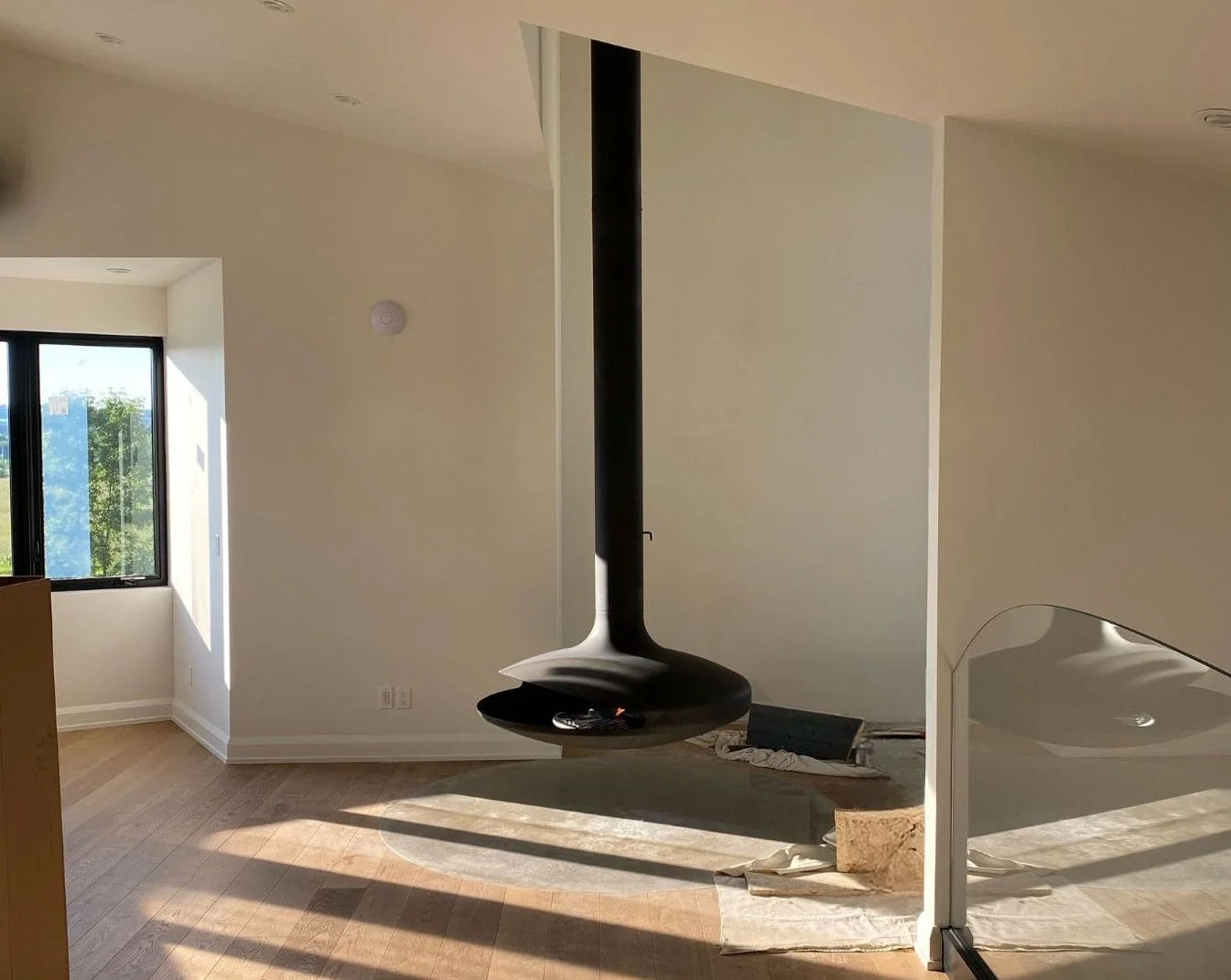 Suspended gas fireplace floating from the ceiling